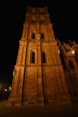 Fototapeta na wymiar Beautiful Night Shot Of The Cathedral's Bell Tower In Astorga. Architecture, History, Camino de Santiago, Travel, Night Photography. November 3, 2018. Astorga, Leon, Castilla-Leon, Spain.
