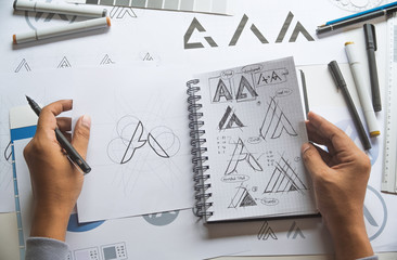 Graphic designer development process drawing sketch design creative Ideas draft Logo product...