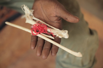 vulture bone medicine on african hand