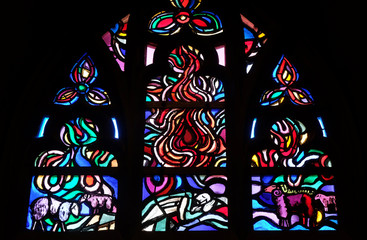 Stained glass window in Cathedral of St. Florin in Vaduz, Liechtenstein - obrazy, fototapety, plakaty