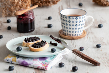 Bread with blueberry jam.