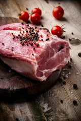 fresh meat on a wooden board. Steak, ribs polar bear, heel