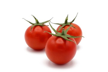 cocktail tomatos - fresh red cocktail tomatos isolated on white background