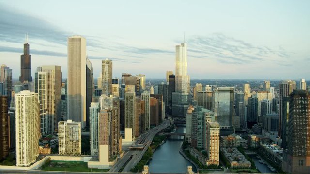 Aerial sunrise view of city buildings and freeways Chicago USA