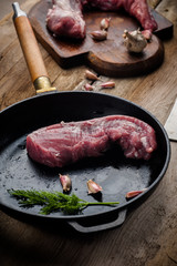 fresh meat on a wooden board. Steak, ribs polar bear, heel