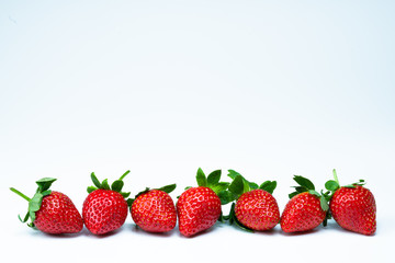ripe red strawberry on white background
