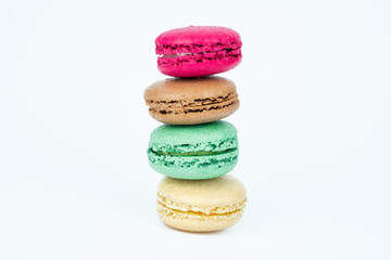 colorful macaroons on white background