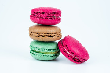 colorful macaroons on white background