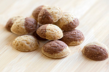 Cinnamon sandbakelse christmas cookies, two color, cocoa dark brown and vanilla light golden brown, delicious czech cookies