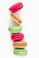colorful macaroons on white background