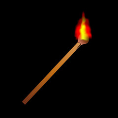 Burning flame head matchstick isolated against a black background.