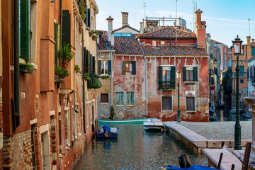 Fototapeta na wymiar Beautiful water channel in Venice Italy 