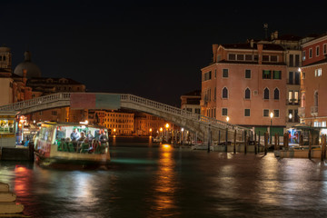 Fototapeta na wymiar Vaporetto on grand canal in the vecinity of the bridge of Scalzi 