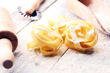 pasta. Fresh homemade pasta with pasta ingredients on the rustic table.