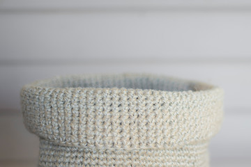 Macro photo of jute knitted basket, copy space and rustic style grey picture for handmade illustration