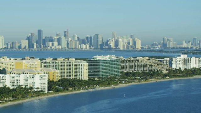 Aerial sunrise view of Key Biscayne Condominiums Island Cape Florida State Park beach Miami Skyline Skyscrapers Biscayne Bay USA 