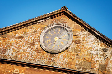 Clock on the stable wall, reading 2.30 pm