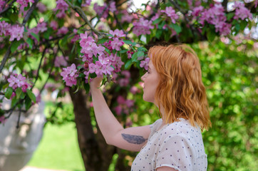 Fototapeta premium young girl with flowers