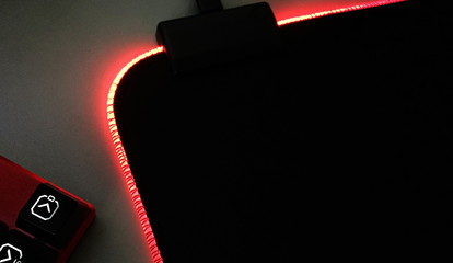 Computer mouse pad with RGB backlight