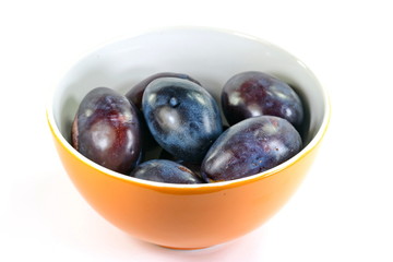 plums isolated on the white background