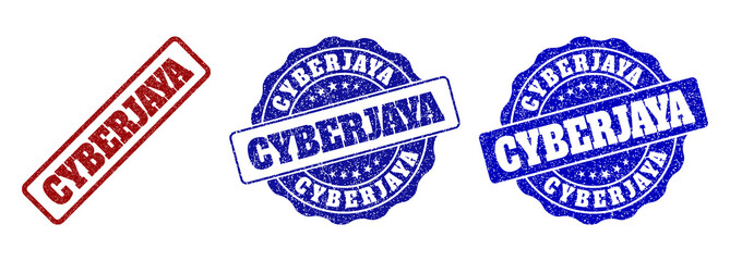 Fototapeta premium CYBERJAYA grunge stamp seals in red and blue colors. Vector CYBERJAYA signs with grunge surface. Graphic elements are rounded rectangles, rosettes, circles and text captions.