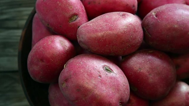 Rotation of red potato closeup, loopable