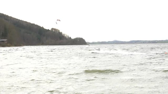 Cold Water Kite Surfing Big Air at Wallersee near Salzburg Austria Slow Motion