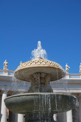 View of a fountain and the Basilica of Saint Peter in Vatican City - ROME, ITALY
