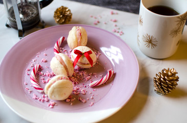 Plate of French Macarons and Candy Cane with Coffee