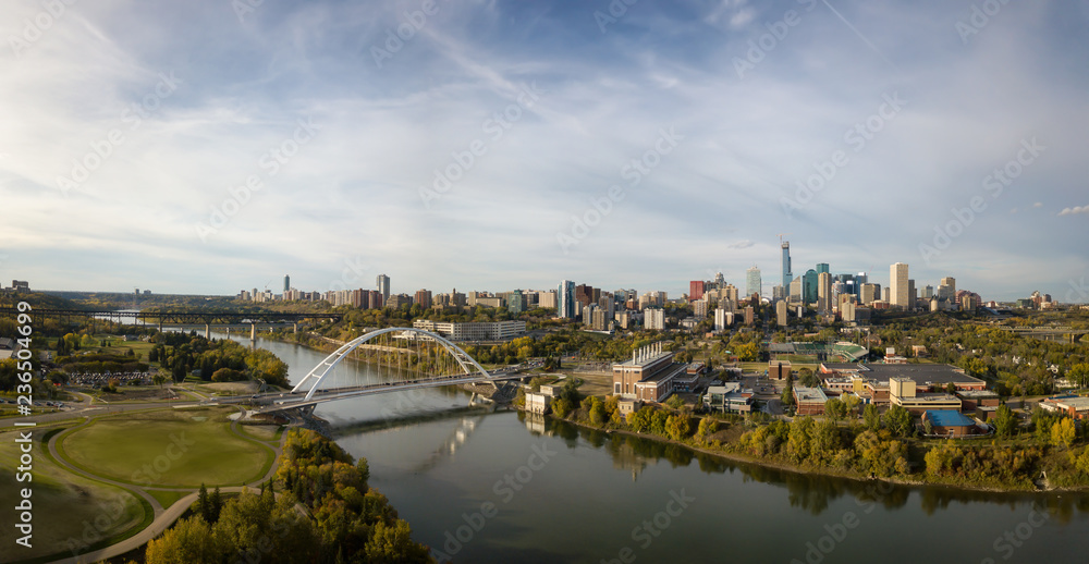 Wall mural Aerial panoramic view of the beautiful modern city during a sunny day. Taken in Edmonton, Alberta, Canada.