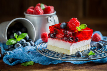 Closeup of homemade cake with jelly and berry fruits