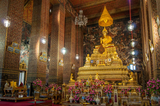  The Principal Buddha Image of Phra Buddha Deva Patimakorn in the Main Chapel or Assembly Hall, Wat Pho, Bangkok, Thailand.