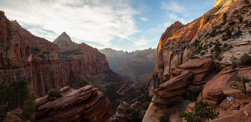 Beautiful aerial panoramic landscape view of a Canyon during a vibrant sunny sunset. Taken in Zion...