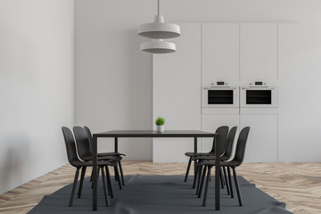 Fototapeta premium White dining room interior, ovens
