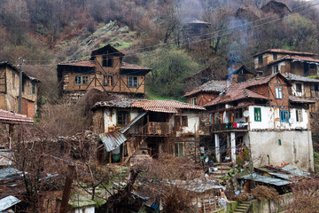 View to old poor houses in the village of Pirin in Pirin Mountains, Bulgaria