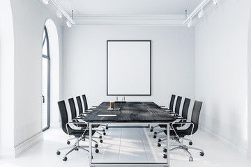 Arched meeting room interior with poster