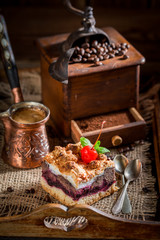 Sweet and tasty cherry pie with pot boiled coffee