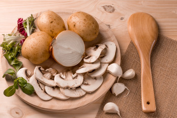 Products for cooking, mushrooms, potatoes, onions, garlic, herbs