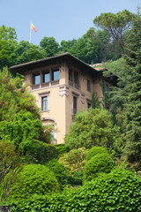 The Flag Of Bergamo and Upper town of Bergamo, Italy