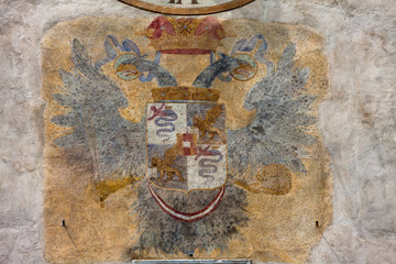 Coat of arms on Bergamo clock tower. Upper town of Bergamo, Italy