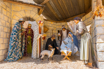 Traditional nativity scene depict three kings visiting the infant Jesus on the night of his birth...