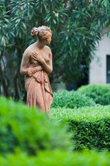 Statue in the garden. Upper town of Bergamo, Italy