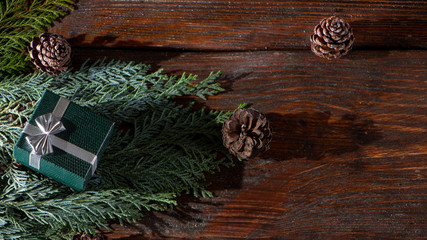 New Year's background with gifts, conifer branches.