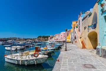 Acrylic prints Positano beach, Amalfi Coast, Italy Fishing boats in the harbor in Marina di Corricella, Procida Island, Gulf of Naples, Italy.