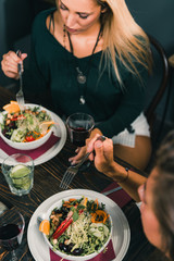 Vegetarian Restaurant. Young Woman In A Vegetarian Restaurant