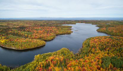 Aerial panoramic view of a beautiful Canadian Landscape during fall color season. Taken near Belledune, New Brunswick, Canada.