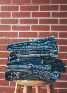 Stack of denim jeans