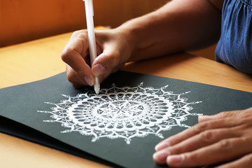 Beautiful mandala painted on a paper
