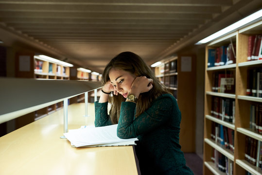 Concentrated woman studying new material