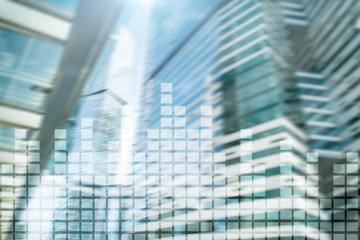 Obraz na płótnie Canvas Financial chart on blurred skyscraper office background.